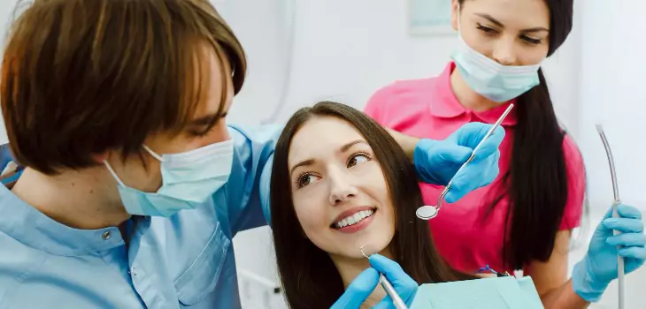 woman during the appointment with the professional dentist