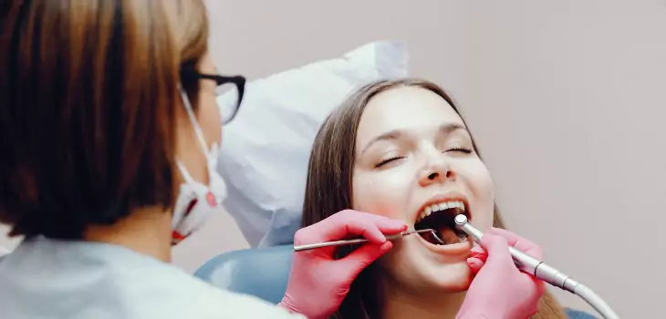 woman during the dental treatment